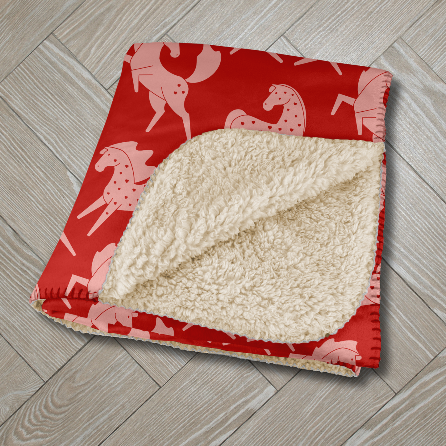 Pink Sweetheart Appaloosa on Red Sherpa Blanket