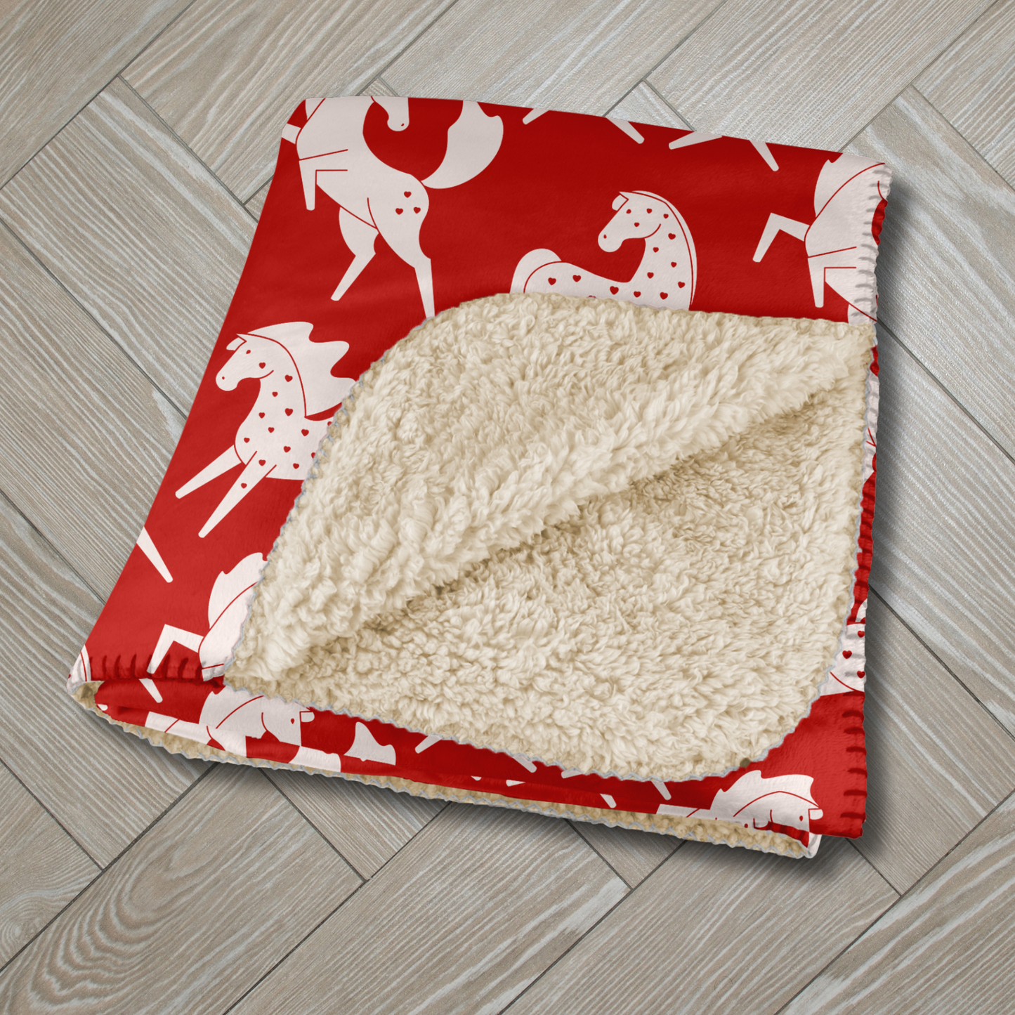 White Sweetheart Appaloosa on Red Sherpa Blanket